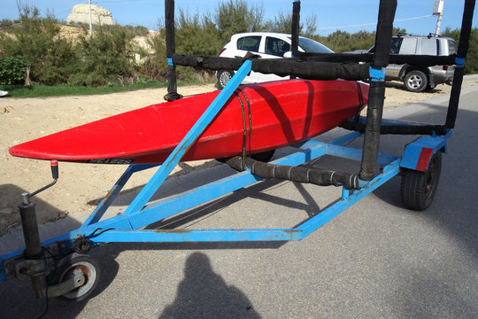 Conoe towing. Trailer with kayak