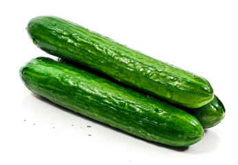 Fresh cucumbers isolated on a white background.