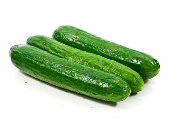 Fresh cucumbers isolated on a white background.