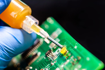 Technical support worker drops the fee PCB