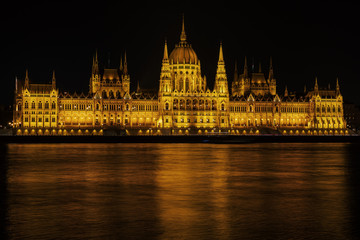 Fototapeta na wymiar Hungarian Parliament building night view from Danube river embankment