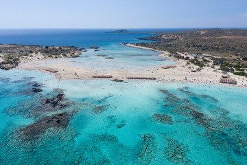 Aerial drone shot of beautiful turquoise beach with pink sand Elafonisi Crete Greece. Best beaches of Mediterranean