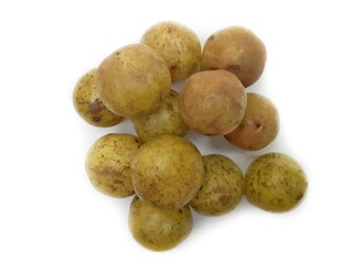 Amla or phyllanthus emblica isolated on white background. Closeup image of Indian gooseberry