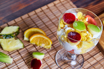 Cornflakes yogurt, honey and fruit - Breakfast 