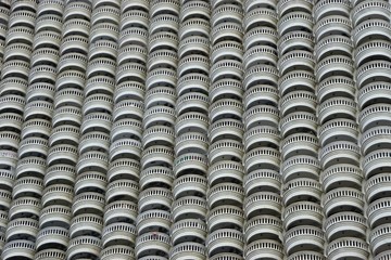 Abstract architectural background with repeating stacked circular shapes