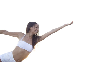 Young athlete girl doing yoga asanas