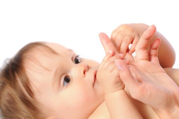 Child holding palm mother with hands
