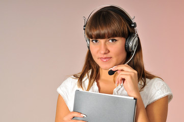 Female consultant with headphones on head
