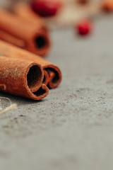 Berries and spices for mulled wine cooking close up on kitchen table