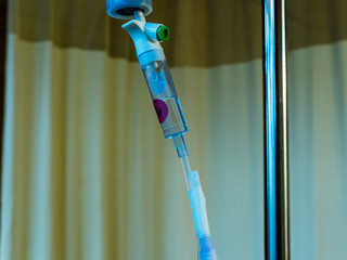 Saline IV drip in hospital room