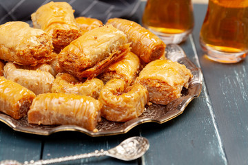 Plate of baklava dessert close up served on table