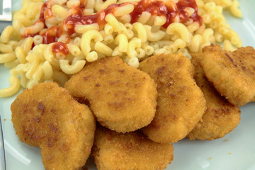 plate of chicken nuggets and pasta