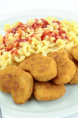plate of chicken nuggets and pasta