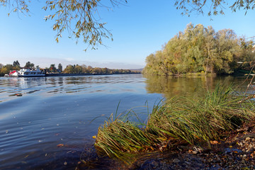 Seine river bank in autumn season. French Vexin regional nature park