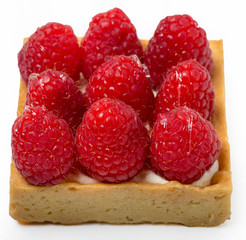 Sand cake with fruit filling, on a white background