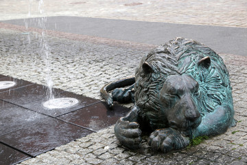 Gdansk, Poland - 06.07.2019: Sculpture of a lion adorning the fountain of four quarters on the...