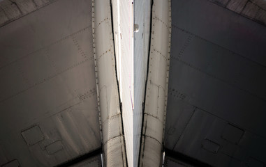 technical aviation background fragment of an airplane wings