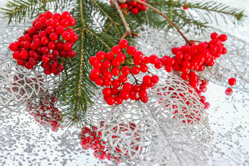 Christmas fir branch with red berries. selective focus