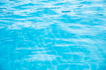 Beautiful Abstract blue swimming pool wave background texture 
