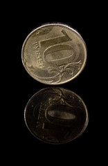 10 roubles coin on glass