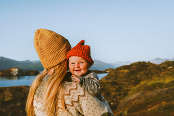 Cute baby and mother walking outdoor travel family vacations lifestyle mom and smiling child...