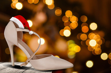 women shoes against Christmas old wood background