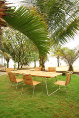 Fototapeta premium Artistic Ethnic Classy Modern Elegant Luxury Indoor Home Interiors and Outdoor Garden Park Furniture Table Chair Cabinet Accessories from Rattan Plastic Wicker or Wooden Materials for Hotel and House 
