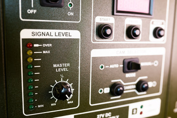 Closeup green panel of television equipment