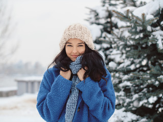 Woman on the Winter Background