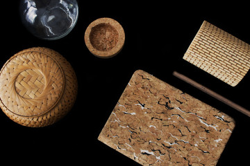 Home decor on black background. Wooden element for home office and business style.