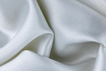 Background texture Luxurious of smooth white silk or satin fabric