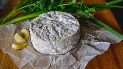 Delicious Brie Cheese with White Mold and Herbs