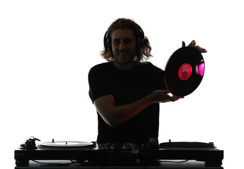 Silhouette of male dj playing music on white background