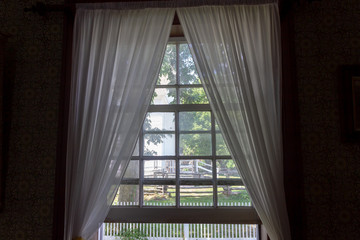 vintage farm window facing summer interior of 18th century