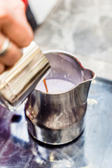 barista making coffee