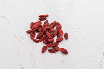 Goji berries isolated on white background. Healthy eating, copy space.