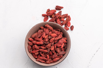 Goji berries isolated on white background. Healthy eating, copy space.