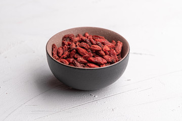 Goji berries isolated on white background. Healthy eating, copy space.