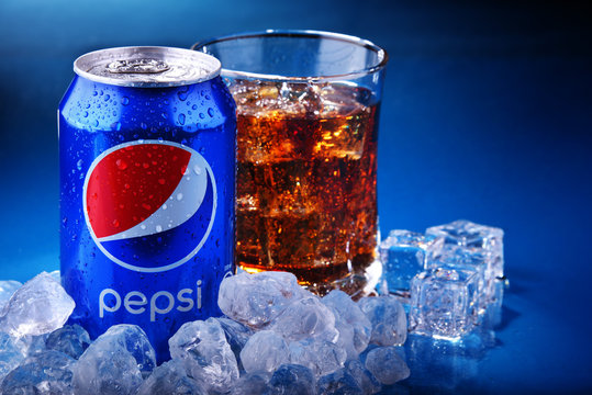 Can and glass of Pepsi with crushed ice
