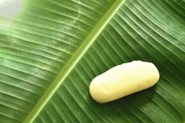  sponge cake stuffed banana cream on leaf 