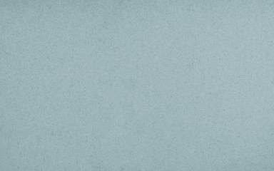 Blue grainy paper.