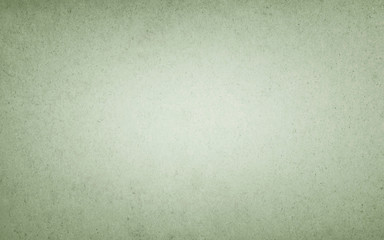 Green grainy paper with vignette.