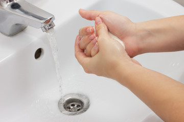 Health and hygiene. Hand washing with soap.