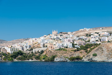 Fototapeta na wymiar Syros island as seen when entering the port from the ship, Cyclades, Greece