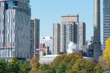 Fototapeta premium Upper East Side Skyline in New York City with Residential Skyscrapers and Colorful Trees during Autumn