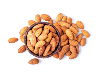 Almond Nuts in wood bowl isolated on white background. top view