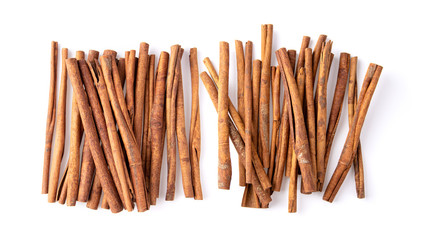 Cinnamon sticks isolated on white background. Top view