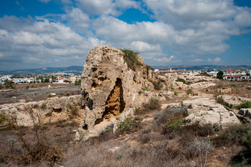 Fototapeta na wymiar The rocks and former quarries of ancient Paphos are very similar to the foundations of the walls, towers, ditches and counterscarps of medieval fortifications. Is that so? Riddle. 