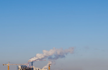 panorama of the city. smoke pipes