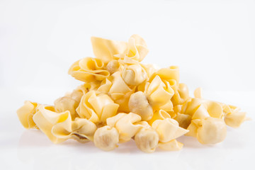 Sacchettini pasta on a white background